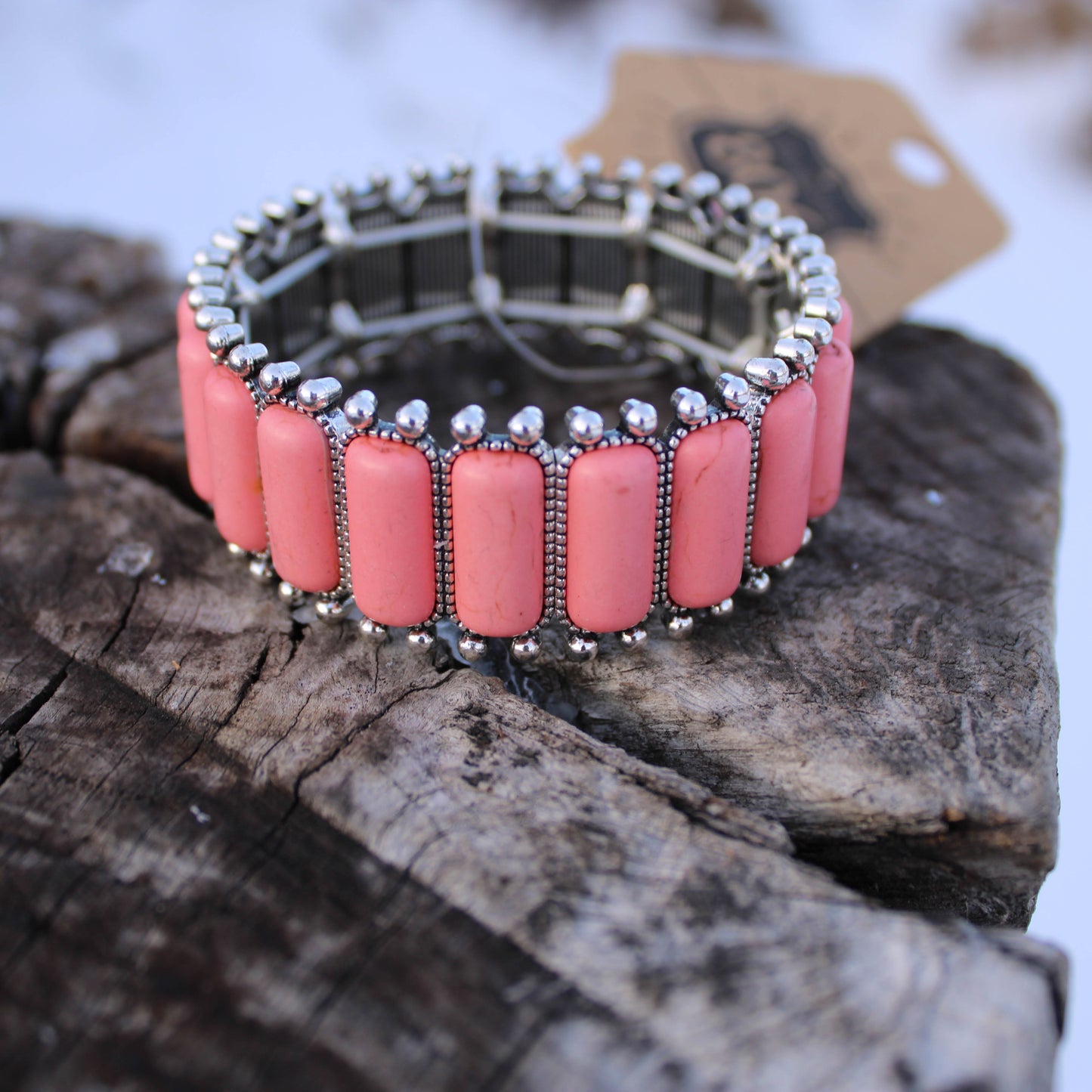 Rectangle stone stretch bracelet- one size fits most - coral stones set in silver backing