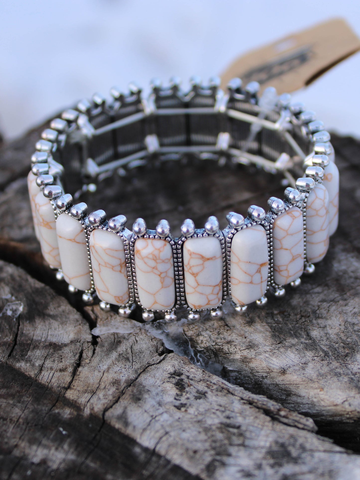 Rectangle stone stretch bracelet- one size fits most - coral stones set in silver backing