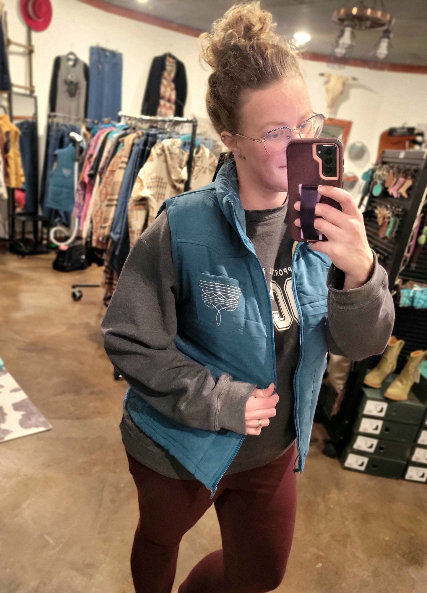 Blue Puffer Vest with Aztec Lining Boot Stitch Detail