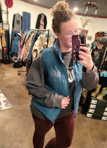 Blue Puffer Vest with Aztec Lining Boot Stitch Detail