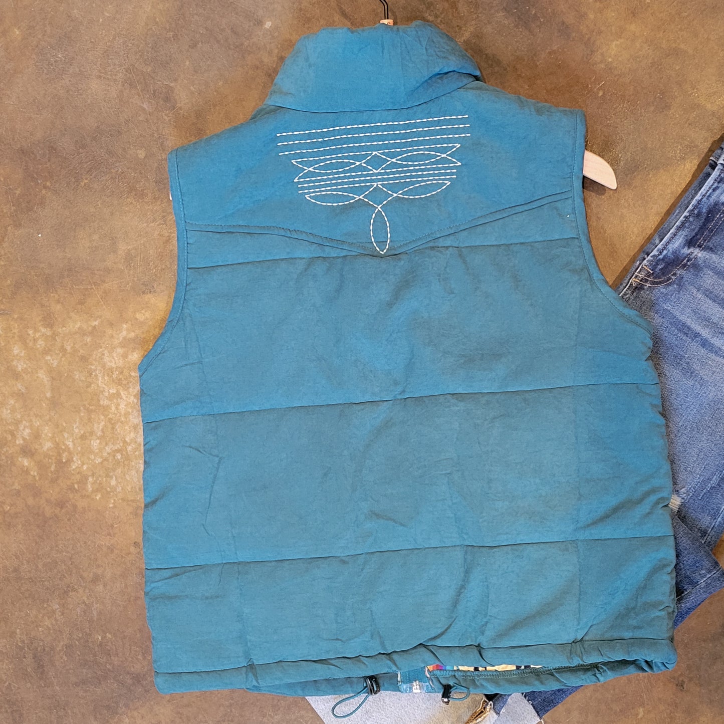 Blue Puffer Vest with Aztec Lining Boot Stitch Detail