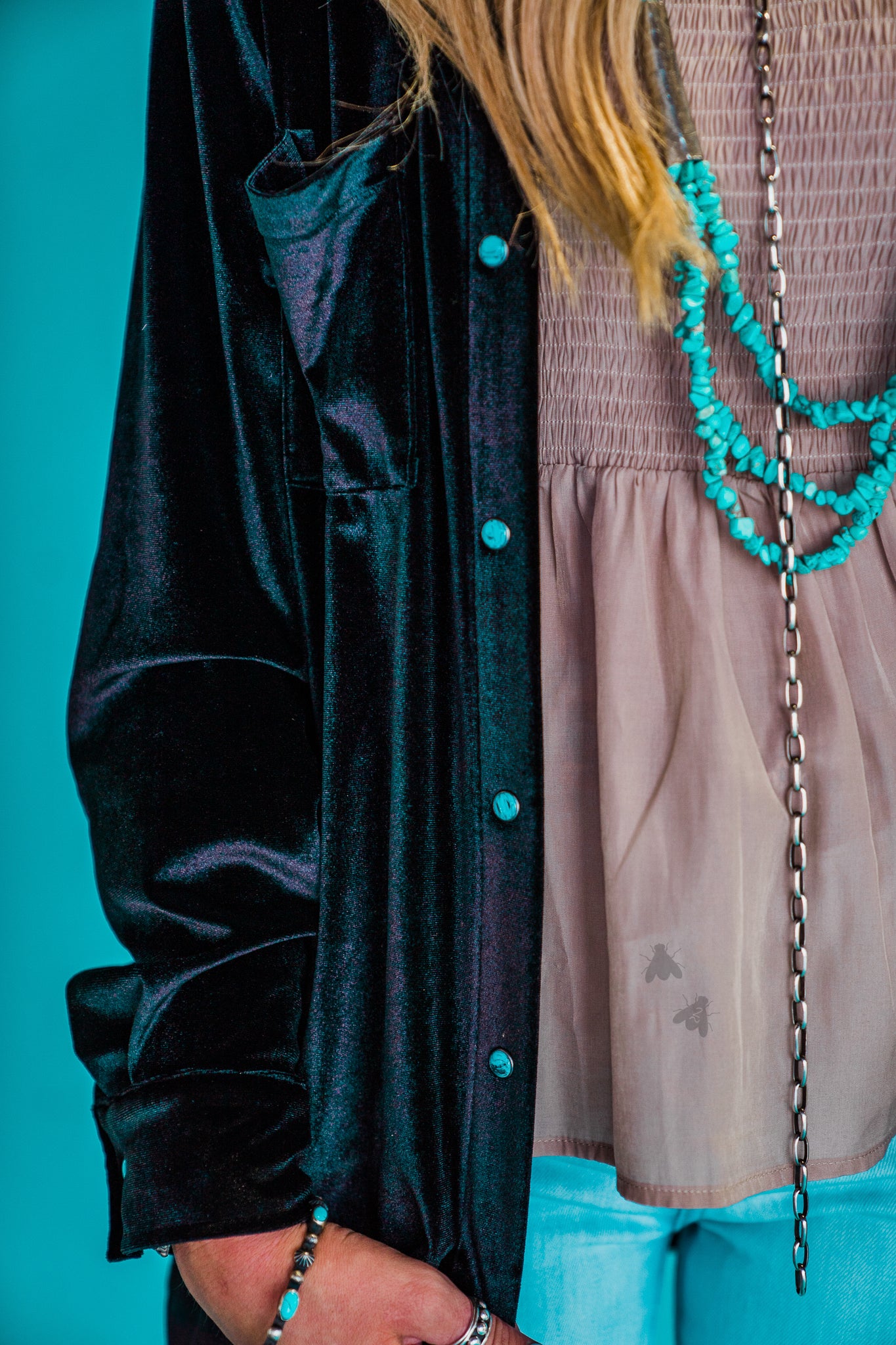 Close up of turquoise pearl snaps